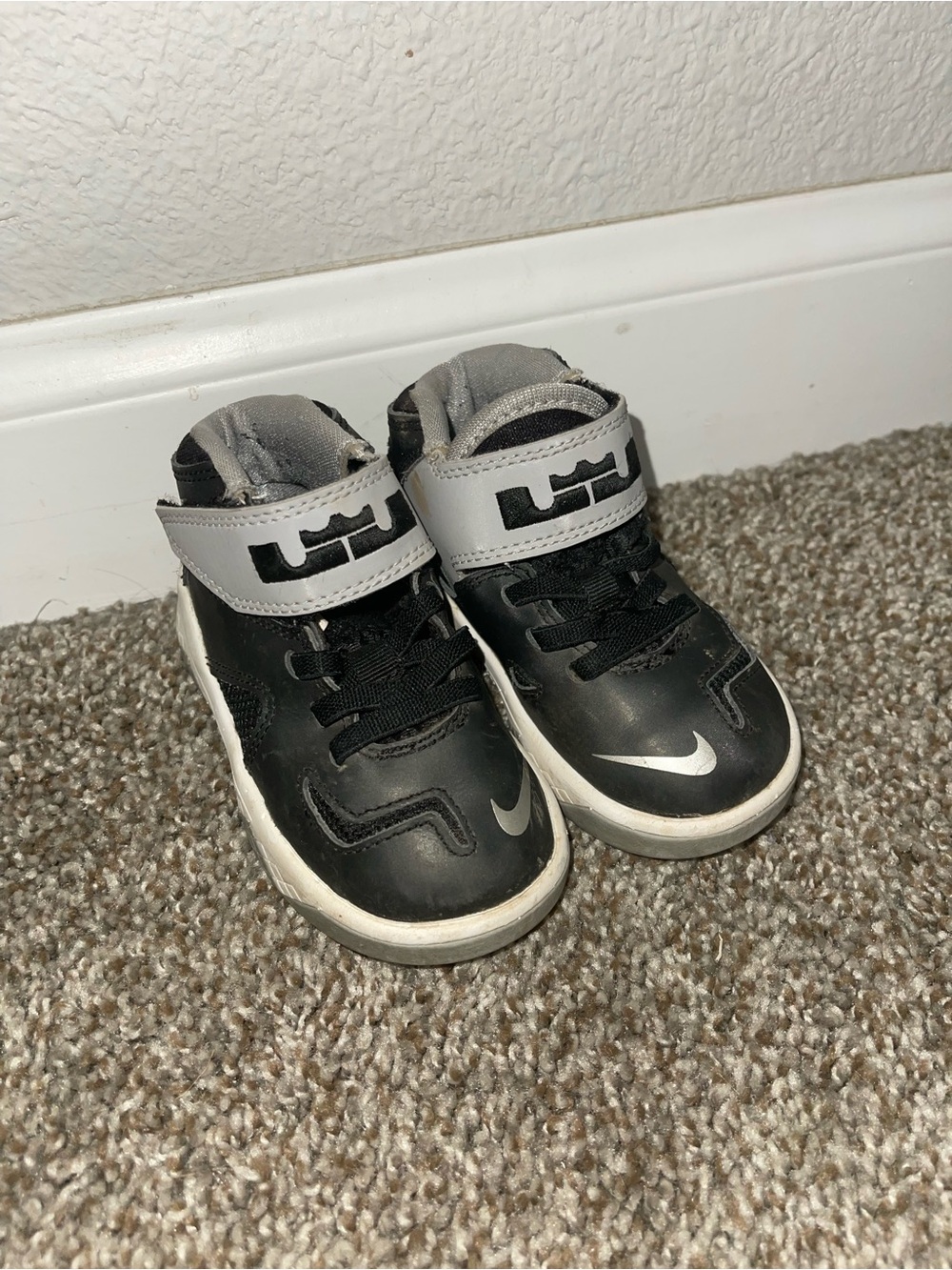 Nike Kids Black and Gray High-Top Sneakers with Silver Swoosh